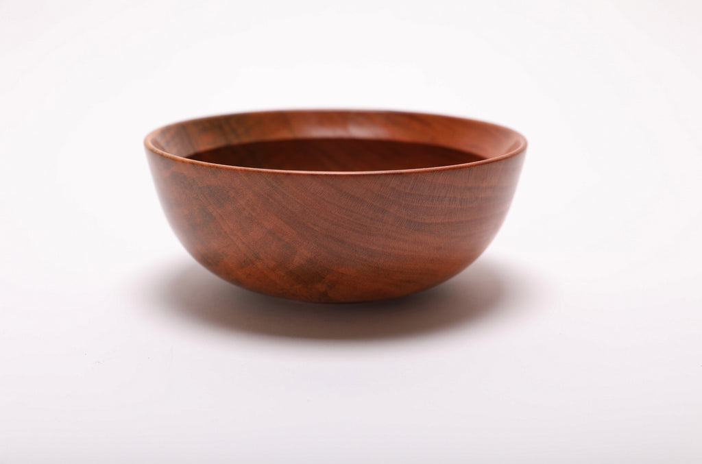 Hand-turned black cherry wood bowl side view, 2 1/4" tall with smooth natural oil finish