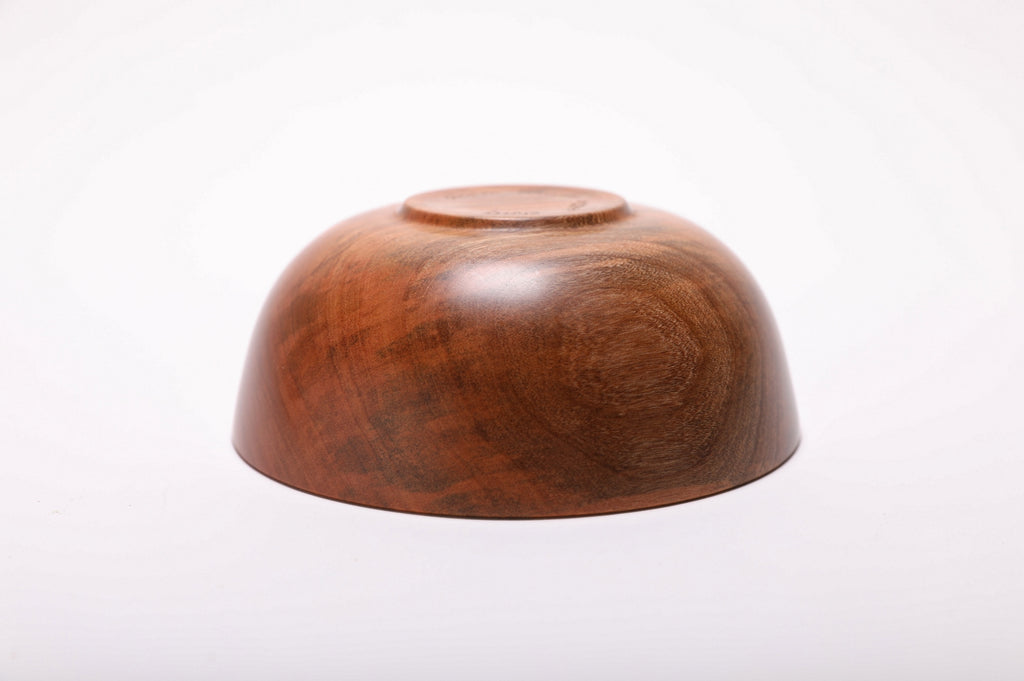 Hand-turned wild black cherry wood bowl bottom view showing raised foot, handmade in NC