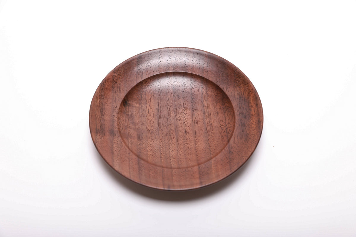 Top view of quartersawn black walnut ring dish highlighting quartersawn ray fleck grain pattern and undercut rim detail