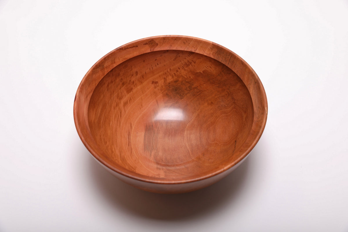 Top view of a Bradford pear serving bowl with natural ambrosia streaks and curved grain