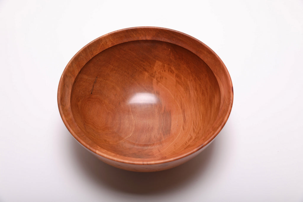 Top view of a shallow Bradford pear wooden bowl handmade by Sanders Woodworking