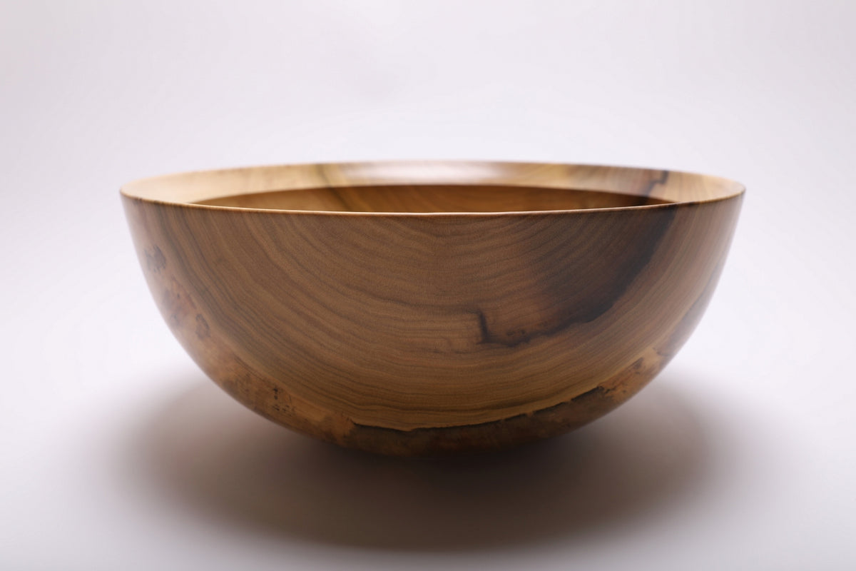 Side view showing the bowl’s 14½-inch width and 6-inch depth