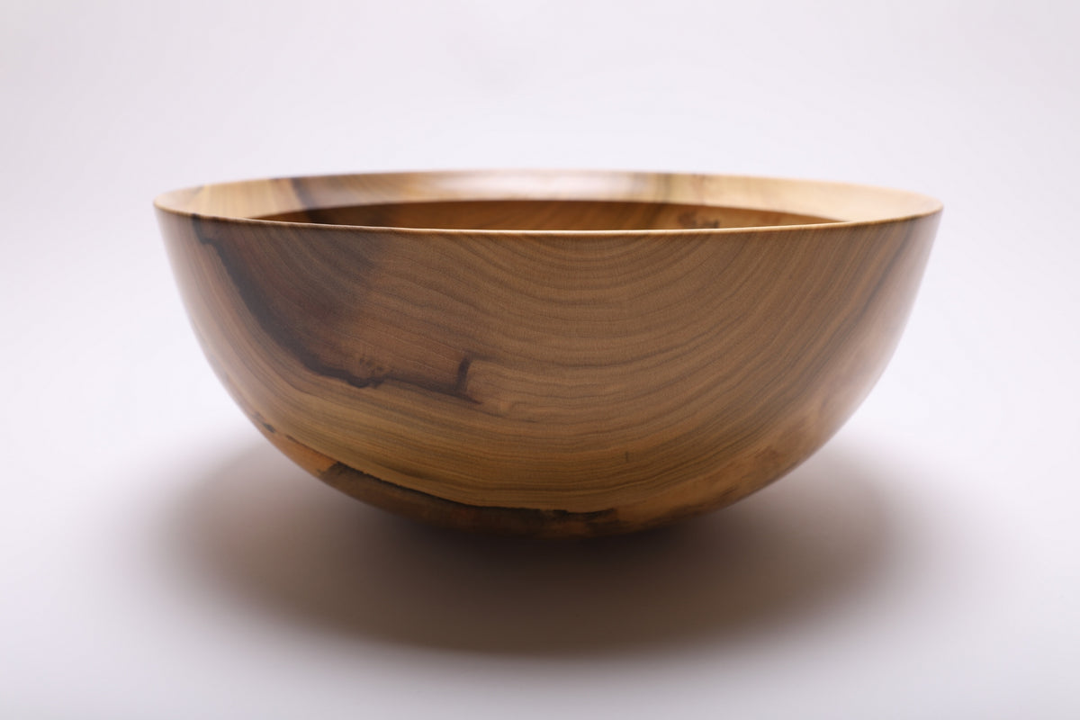 Side view showing the colorful tulip poplar grain across the bowl’s exterior