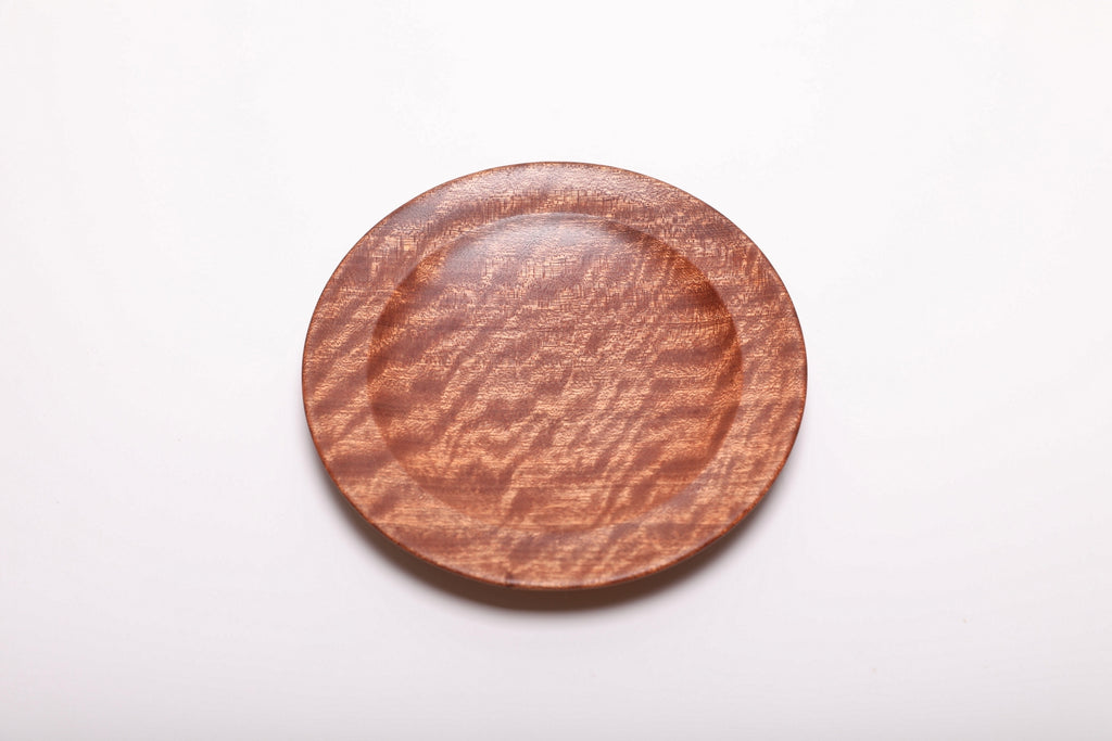 Overhead view highlighting the natural color and figure of the sapele dish