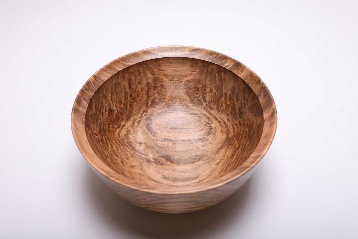 Top view of the spalted maple bowl with dark markings framing a lighter center