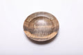 Spalted tiger maple ring dish viewed from above, with fine black lines, gray-brown grain and a golden band across the near rim.