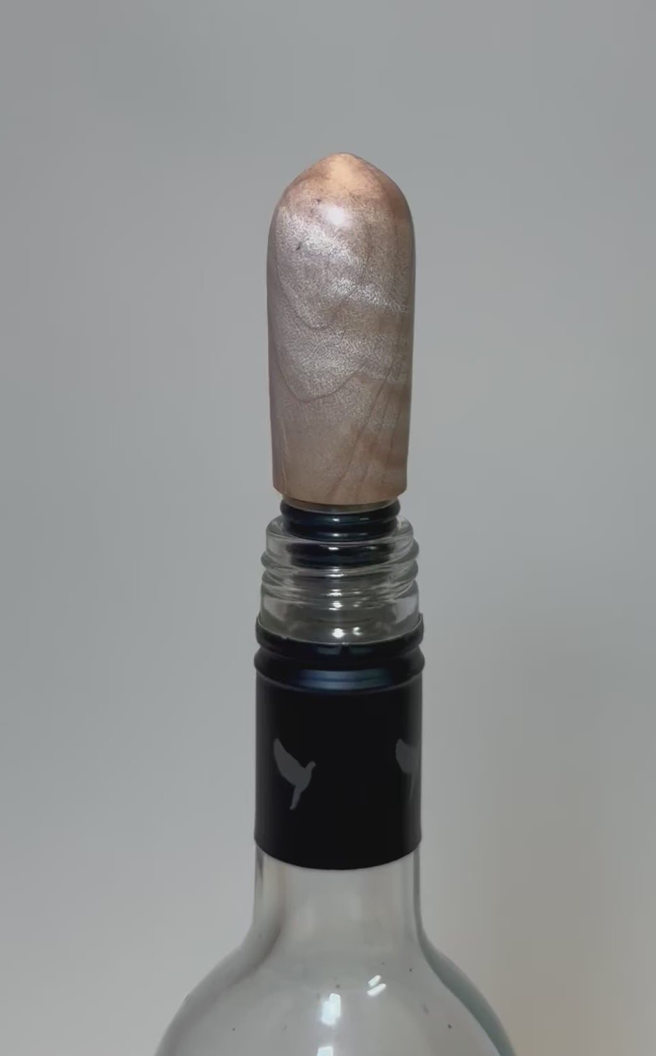 Video demonstration of big leaf maple burl wine stopper showing wood grain detail and craftsmanship