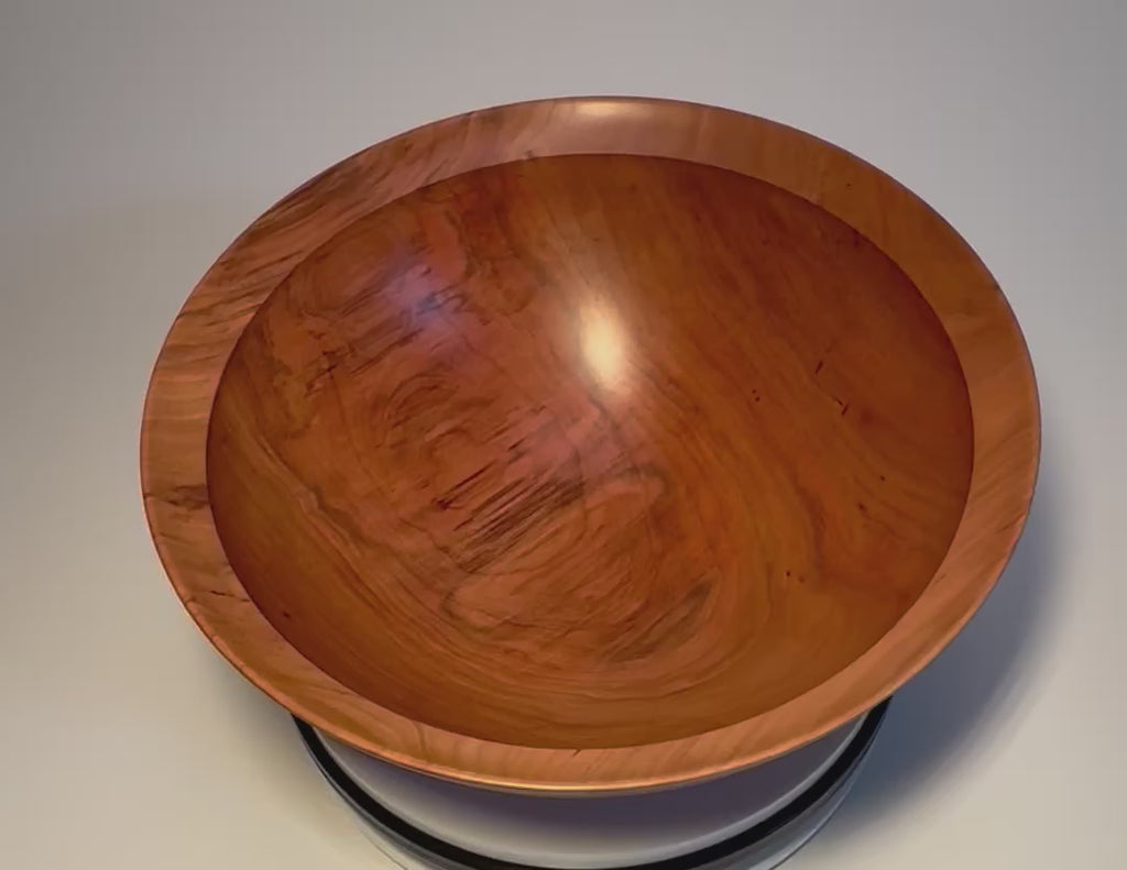 Handcrafted spalted wild black cherry fruit and salad bowl rotating on display stand – 360° view of copper-pink tones, amber growth rings, and spalting	