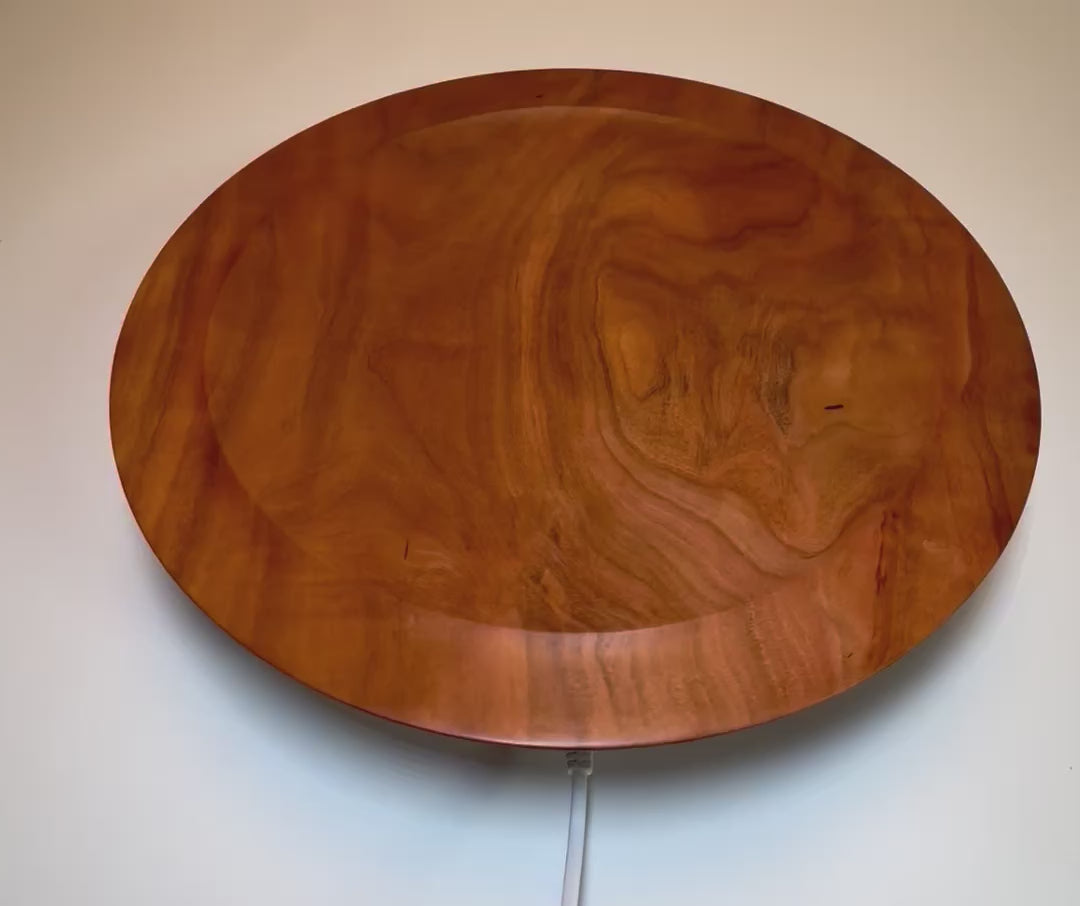 Wild black cherry wooden platter — 360° rotating view showing natural grain, undercut rim, raised foot, and food-safe oil finish, handcrafted by Sanders Woodworking in NC