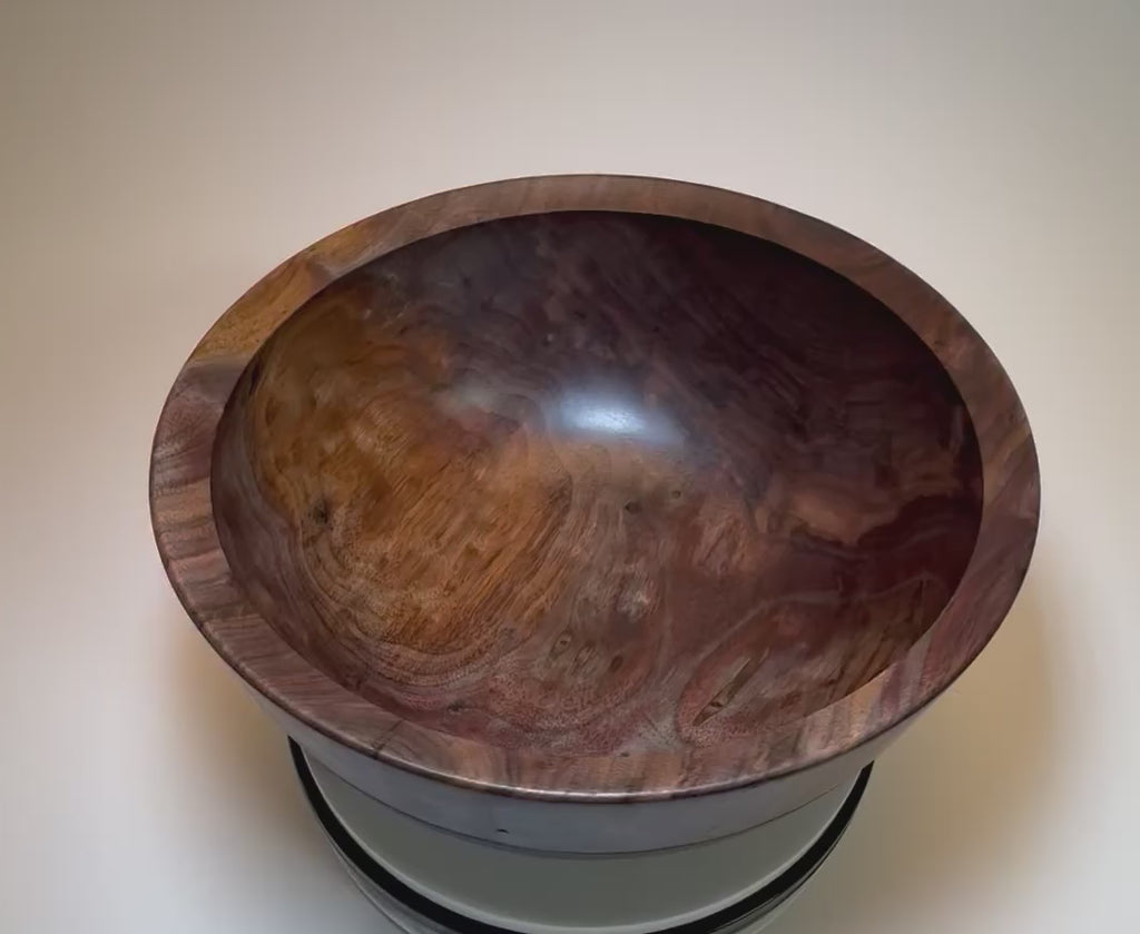 Video of spalted curly black walnut bowl rotating to show spalting, curly grain, and color from cream to dark chocolate