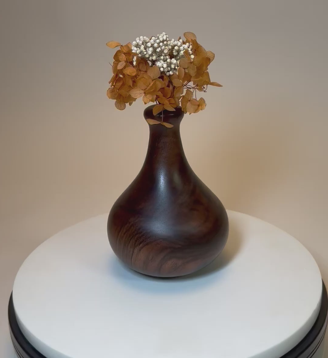 Handcrafted claro walnut burl weed pot 3 7/8 x 5 1/4 inches, turned from rare veneer core, with dried flower arrangement, Sanders Woodworking, made in North Carolina