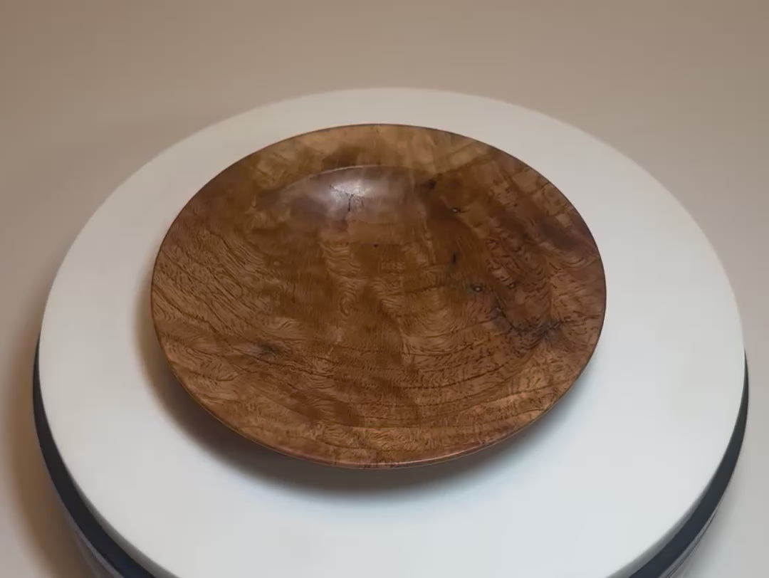 Wormy white oak crotch burl wooden bowl rotating 360° on display stand, showcasing marble-like burl figure, worm hole character, and food-safe oil finish — Sanders Woodworking