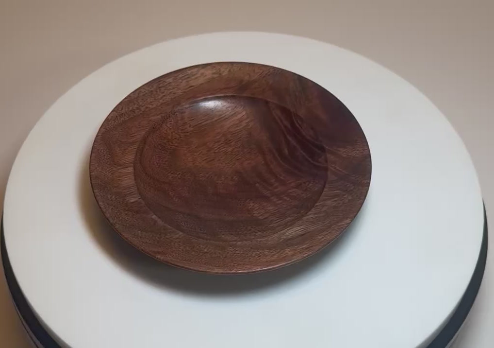 Black walnut crotch burl wooden jewelry dish rotating 360° on display stand, showcasing intact burl figure, dark chocolate and amber tones, and handcrafted oil finish — Sanders Woodworking