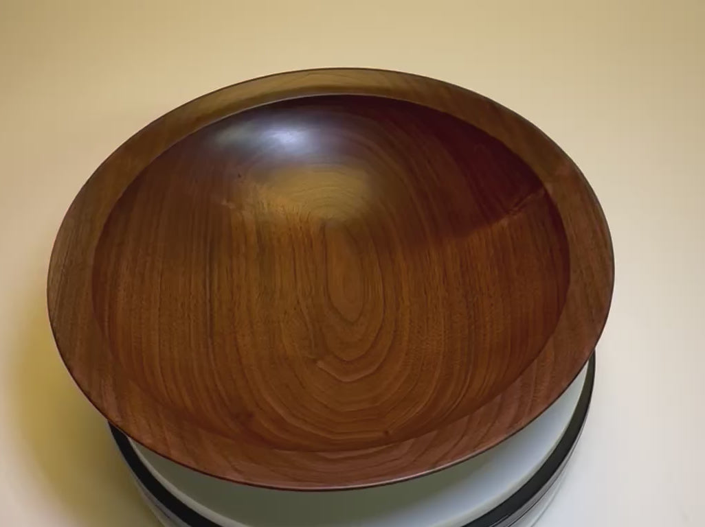 Video showcasing wild black walnut bowl with red undertones and chocolate grain transitions
