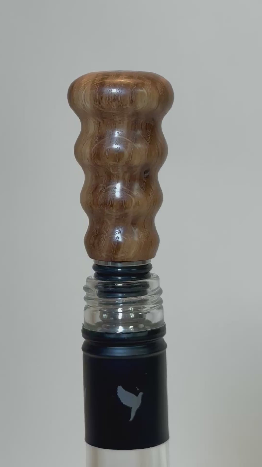 Video demonstration of white oak wine bottle stopper showing wood grain detail and craftsmanship