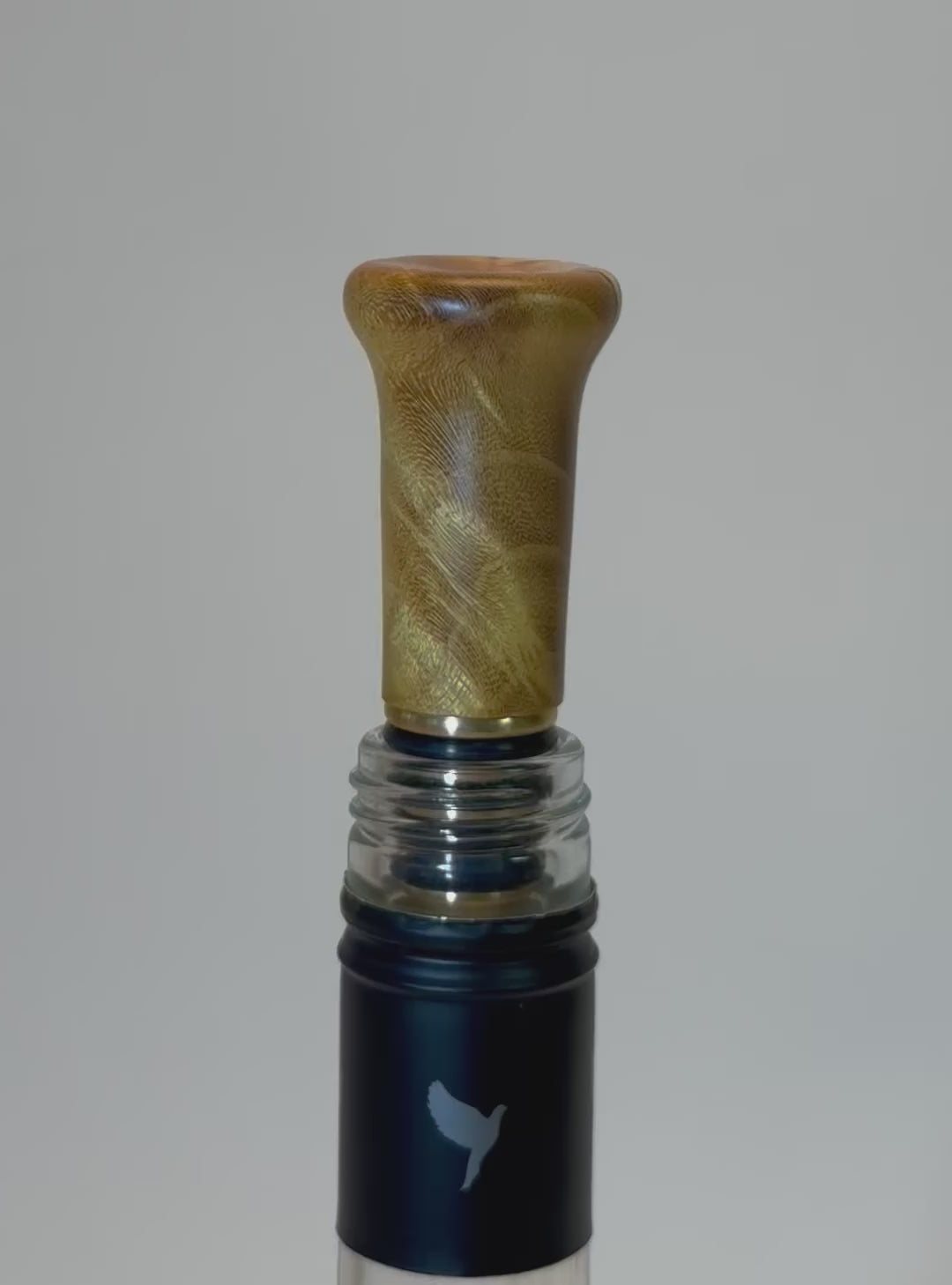 360-degree view of mulberry burl wine stopper showing burl figure and brass fitting detail