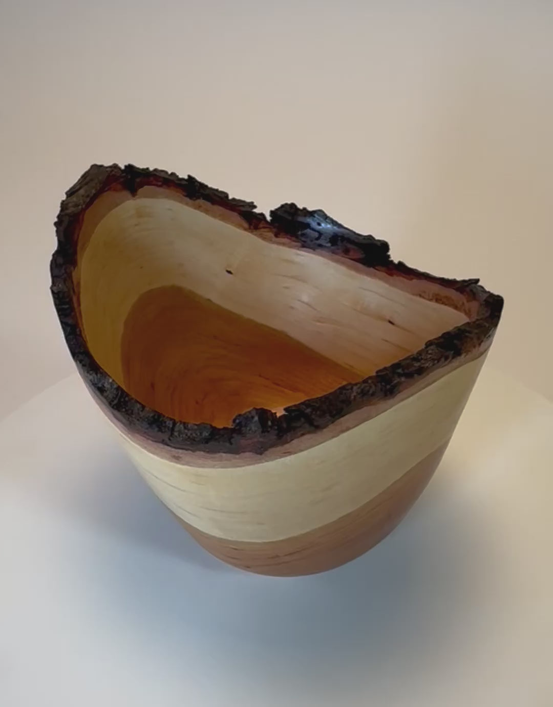 Handmade natural edge wild black cherry wooden bowl – live edge with intact bark, rotating view – Sanders Woodworking